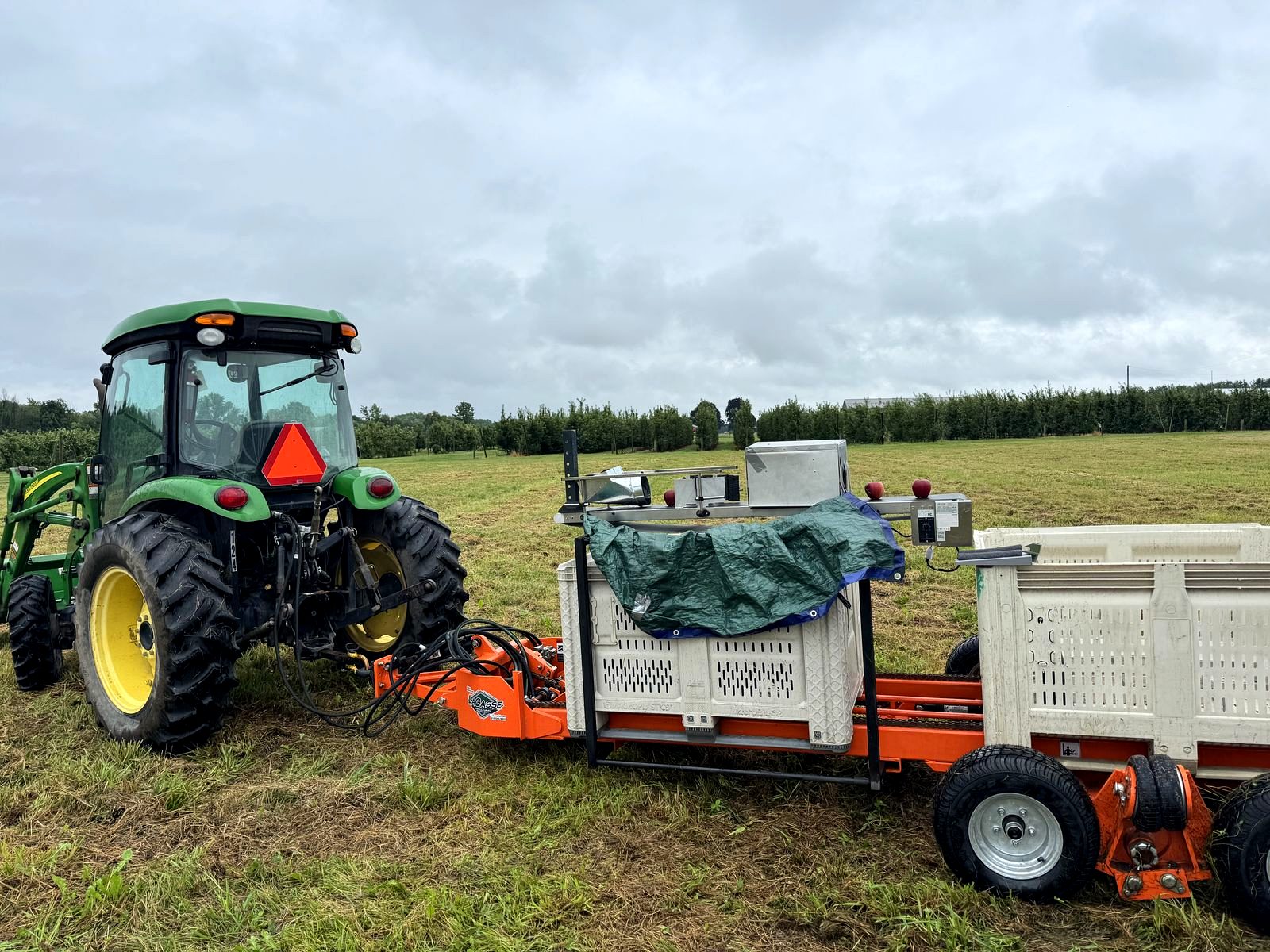 FieldSorter 1 on its trailer, towed through a customer orchard